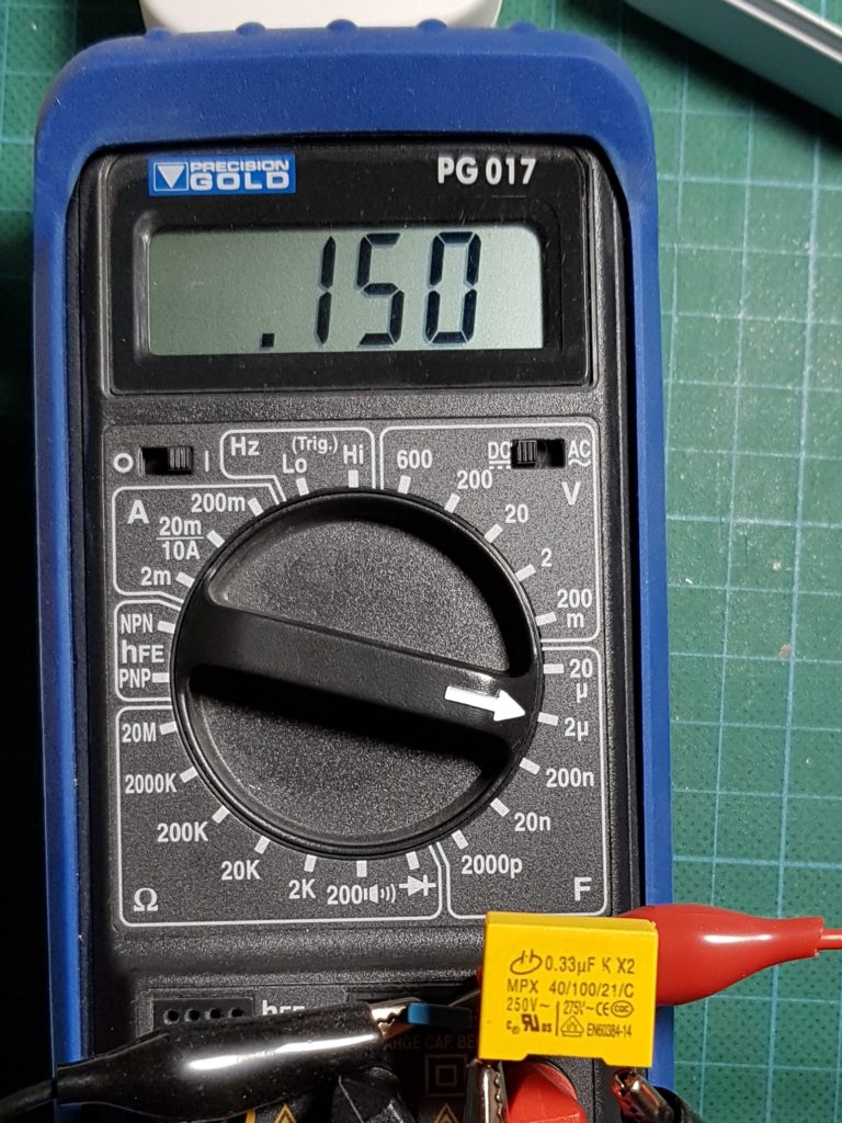 Shows 0.33 uF capacitor measures 0.15uF