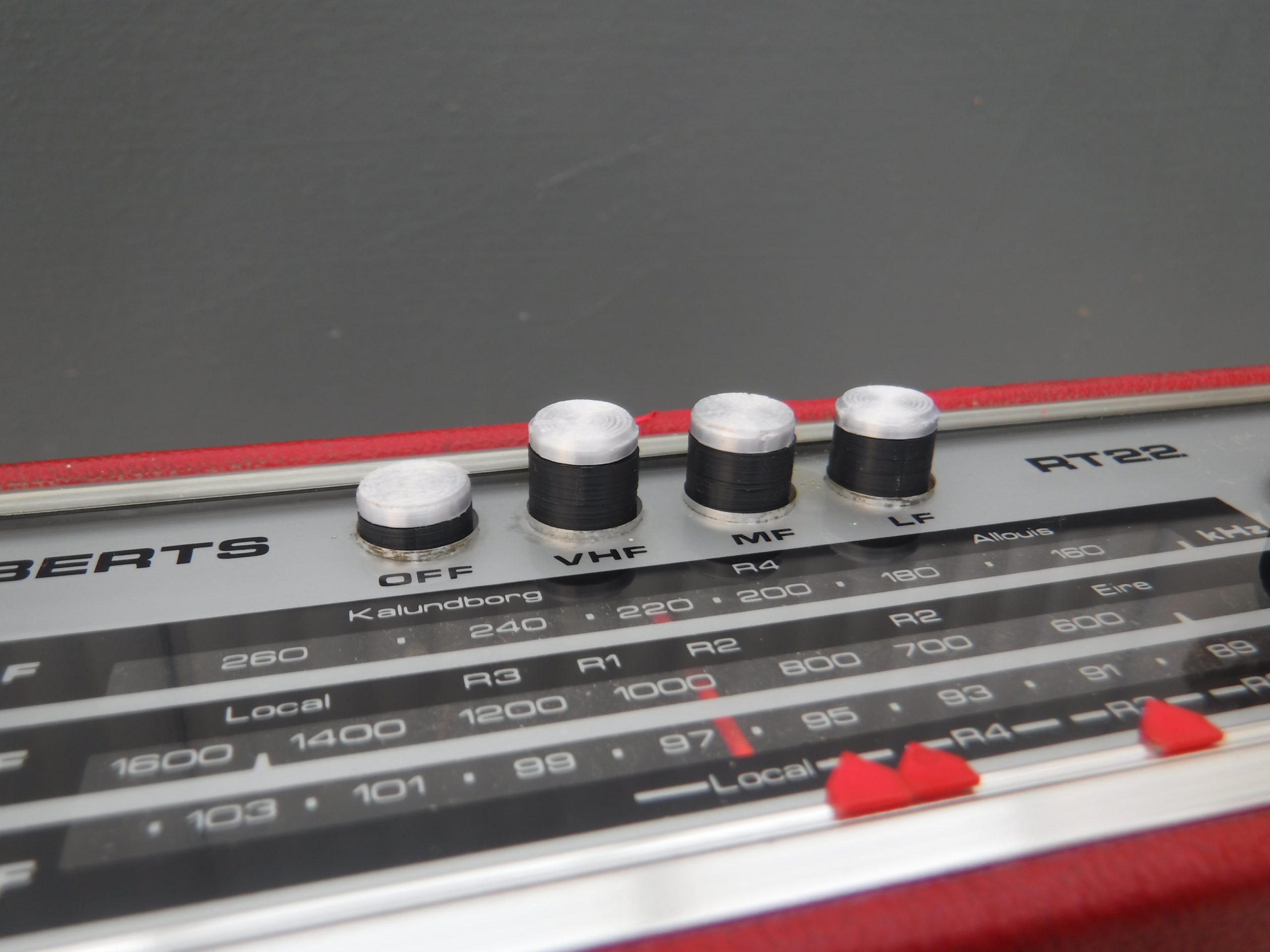 3D printed push button caps.