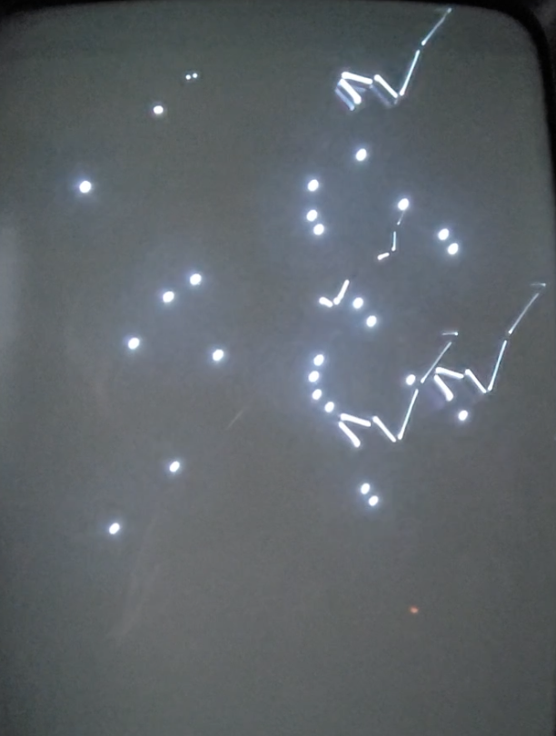Vectrex Mine Storms displaying dots and incomplete shapes