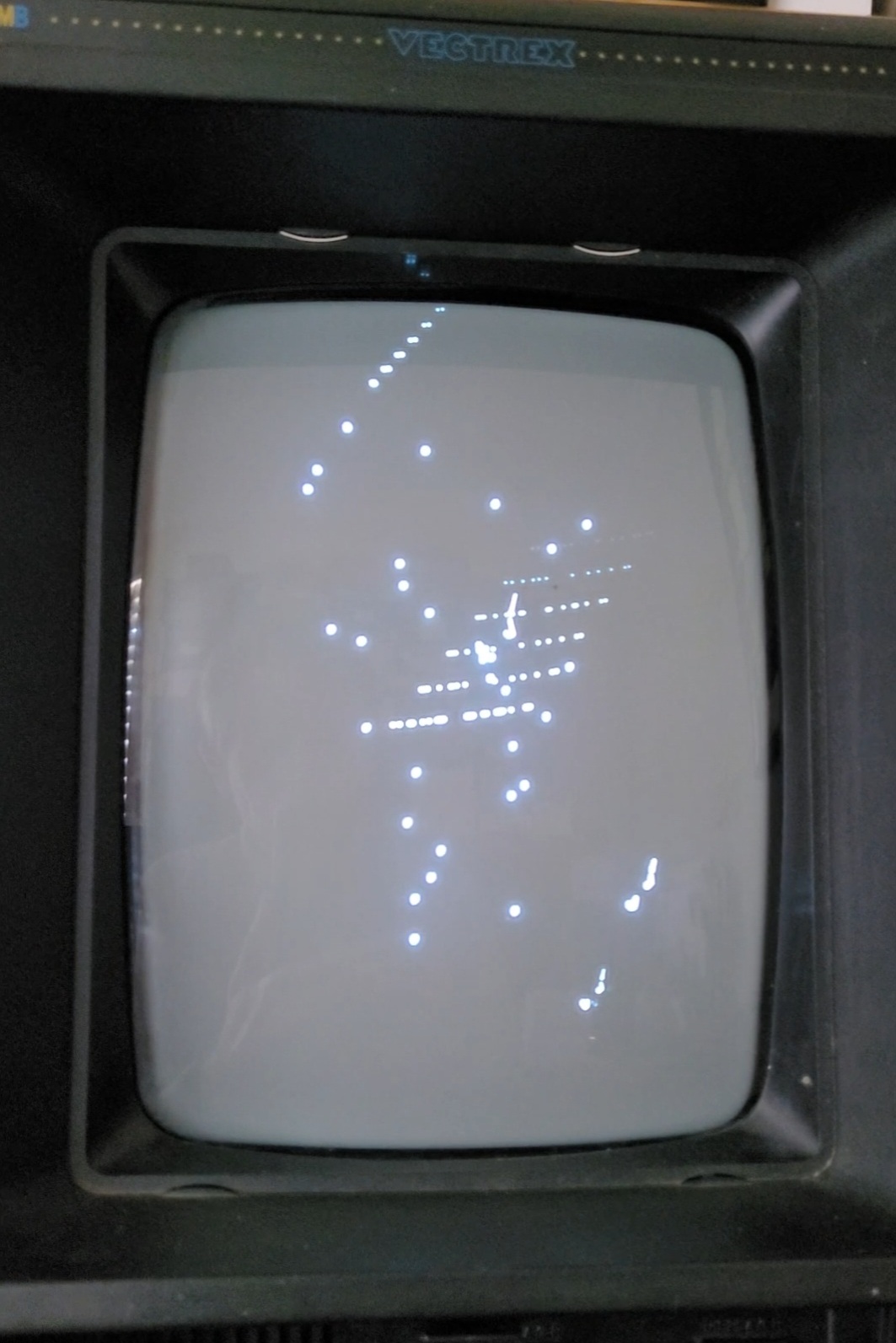 Vectrex display after replacing DAC chip shows staircase lines for text and dots.