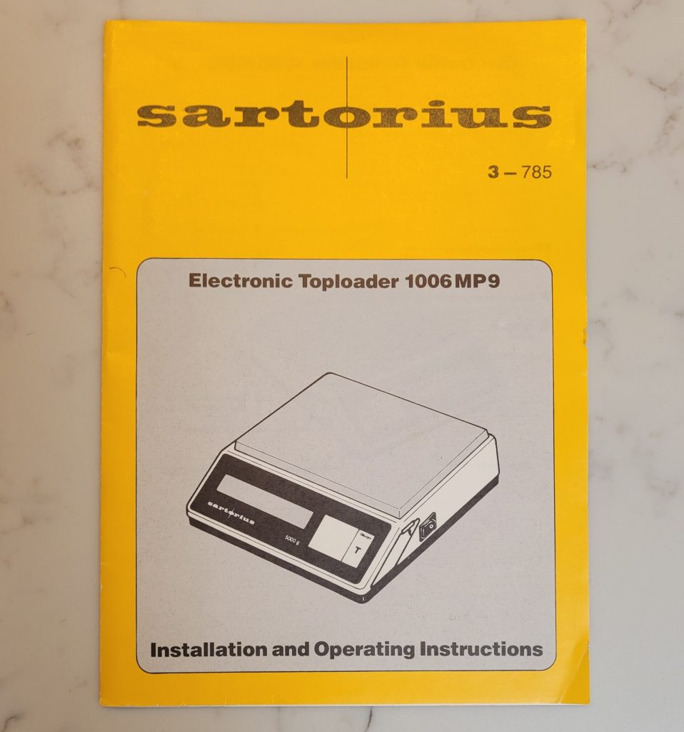 Front page of Sartorius electronic toploader 1006 MP9 instructions.